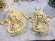 Pair of cast lion head door knockers