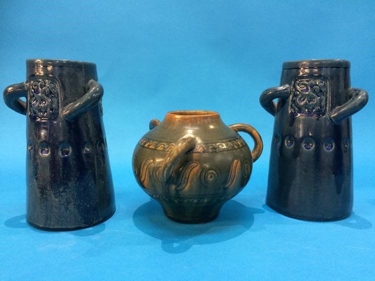 A pair of Adamask three handled vases, on a mottled blue ground and a small squat shaped three - Image 2 of 4