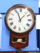 A mahogany wall clock