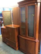 A yew wood corner cabinet and two cabinets