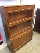 An oak three tier stacking bookcase