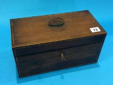 A mahogany tea caddy