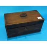 A mahogany tea caddy