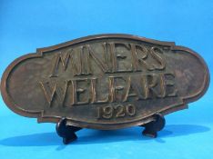 A large Edwardian bronze 'Miners Welfare 1920' wal