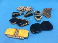 Seven various decorative buckles