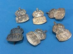 Collection of six silver A.R.P. Warden's badges