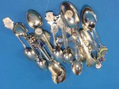 Large collection of enamelled spoons, predominantly silver, 308 grams