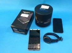 A Blackberry key 1, iPhone and a Gear S3, sold as seen (spares/repairs)