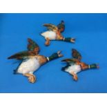 A set of three Beswick graduated wall ducks, numbe