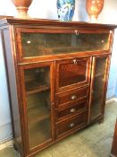 An oak bureau display cabinet