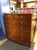 A 19th century bow front chest of drawers with two