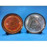 A Poole pottery charger by Diana Davis, 'Jouster' and another of an 'Owl' (2), 32cm diameter