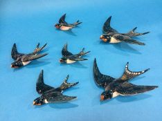 Two sets of three Beswick Swallows, numbered 757