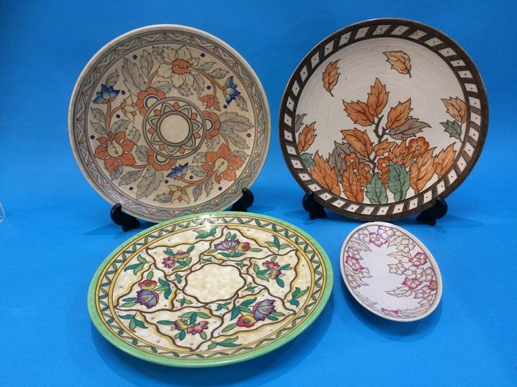 Three Crown Ducal wall chargers by Charlotte Rhead and a small dish (4)