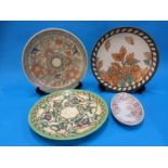 Three Crown Ducal wall chargers by Charlotte Rhead and a small dish (4)