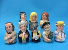 A set of eight Royal Doulton figures