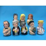 A set of eight Royal Doulton figures