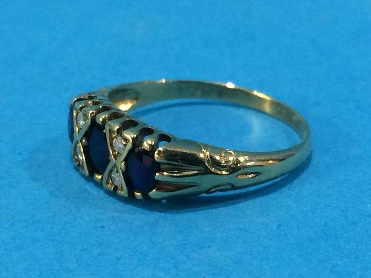 A gold ring, mounted with diamonds and sapphires, size P - Image 2 of 2