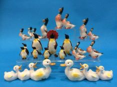 A collection of Beswick ducks and penguins