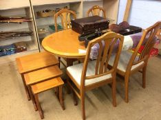 Teak dining table, four chairs and a teak nest of tables