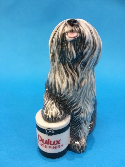 A Royal Doulton 'Dulux' dog