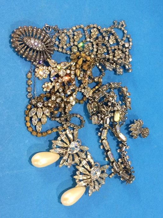 Four various diamante necklaces, earrings etc.