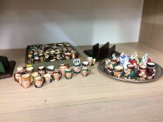 Collection of mini Royal Doulton jugs and figures