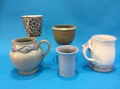 A Poole tankard with dolphin handle, a Carter Stabler jug, T313 and three Poole vases (5)