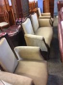 An Edwardian mahogany and upholstered suite