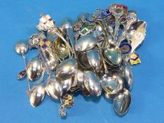 Large collection of enamelled spoons, predominantly silver, 630 grams