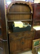 An oak dresser and oak corner cabinet