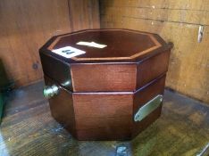 An octagonal boxed Quartz clock