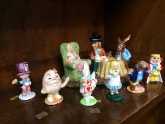 Royal Doulton Beswick Ware 'Mad Hatters Tea Party' group and six 'Alice in Wonderland' figures