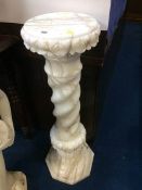 An alabaster pedestal