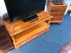 A yew wood side table, three drawer chest etc.