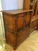 An oak Chapmans 'Siesta' cabinet