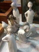 Five Lladro figures and two Rex figures