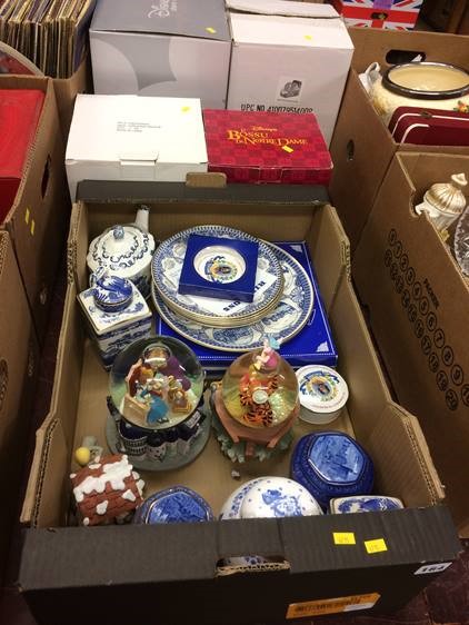 Collection of snow globes and Ringtons china