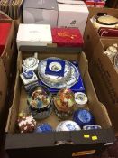 Collection of snow globes and Ringtons china