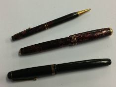 A Parker fountain pen and two others