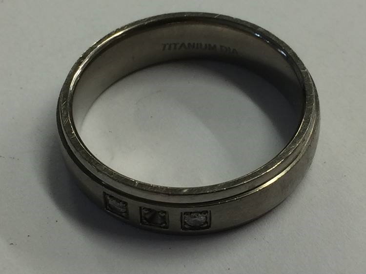 A Gents titanium and diamond ring