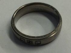 A Gents titanium and diamond ring