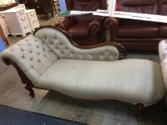 A Victorian walnut scroll ended chaise longue