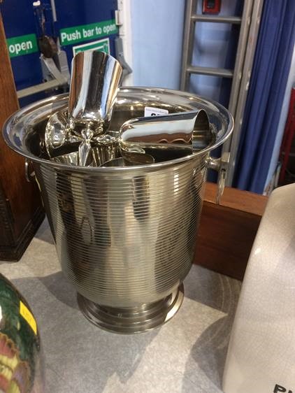 A silver plated Champagne bucket and six goblets