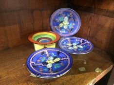 A small Carlton ware Liberty pattern bowl and four Carlton ware plates