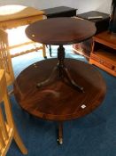 A reproduction mahogany Chapman 'Siesta' circular occasional table and another