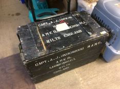 Military trunk containing stoneware jugs