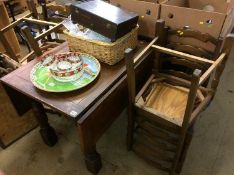 An oak dining table and 4 chairs