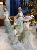 Four Nao figures of Ladies