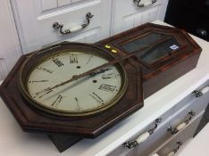 A rosewood wall clock